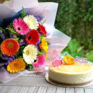 Colourful bouquet and birthday cake