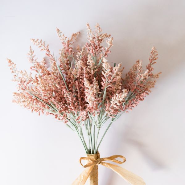 Pink dried flowers with a twine ribbon