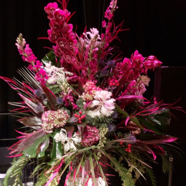 Large pink pedestal flower arrangement