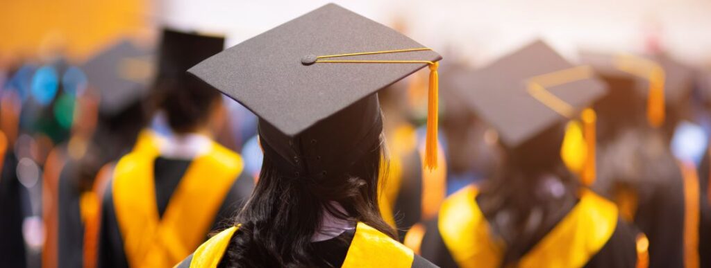 person wearing a graduation cap and gown