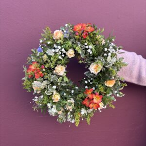 eco wreath made with seasonal soft coloured flowers